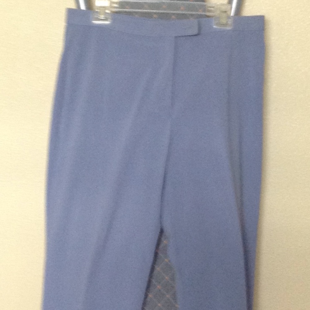 Light blue slacks.